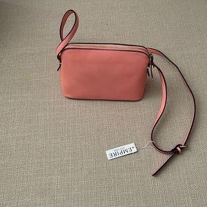 Coral colored pocketbook